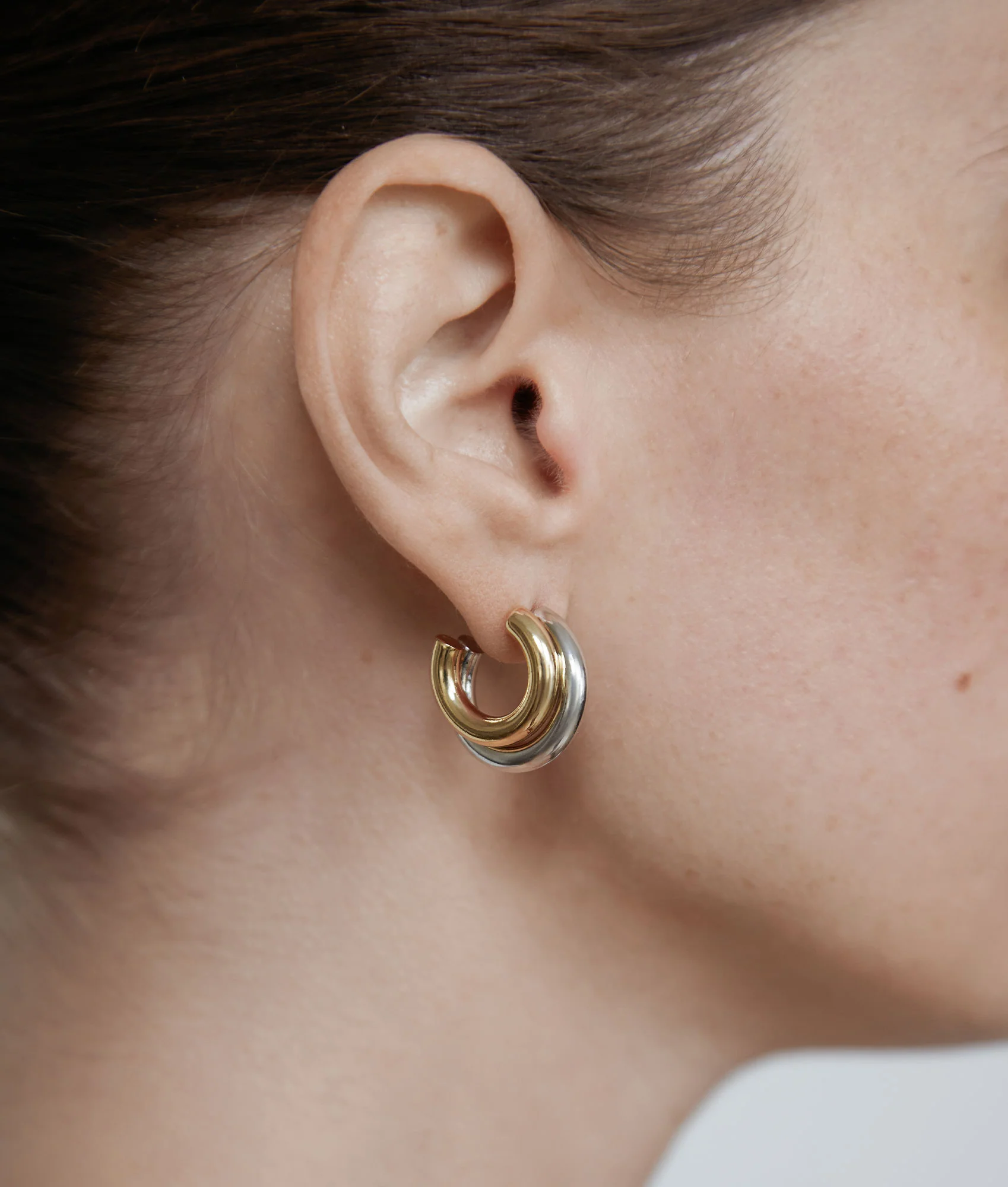 4473-shashi-two-toned-double-hoop-earrings-2.webp SHASHI Two Toned Double Hoop Earrings